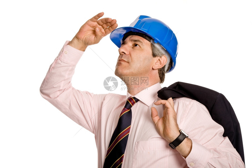 一个戴着蓝帽子的工程师孤立在白色上图片