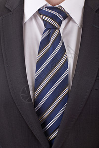 商机细节特写外套男子和有蓝色领带的衬衫图片