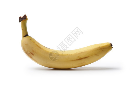 白色背景上一个完整的无皮香蕉图片