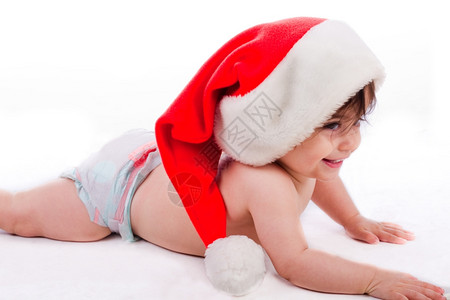 圣诞老人宝试图爬在孤立的白色背景背景图片