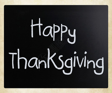 感恩节快乐手写白色粉笔在黑板上背景图片