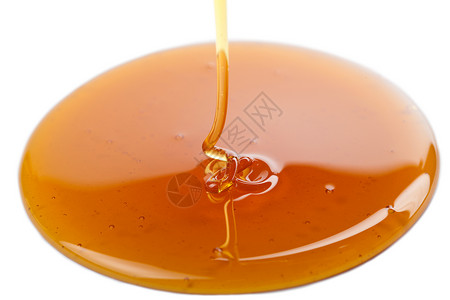 孤立的蜂蜜果糖糖浆高清图片
