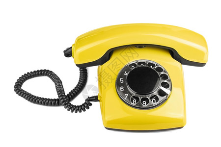 孤立的旧黄电话背景图片