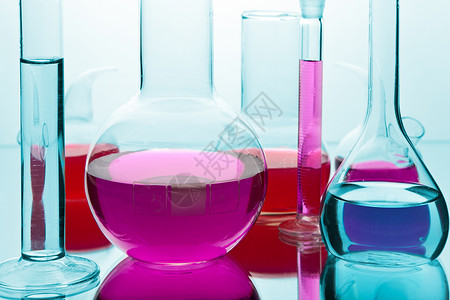 健康解决方案装有多彩化学物的实验室玻璃软件背景