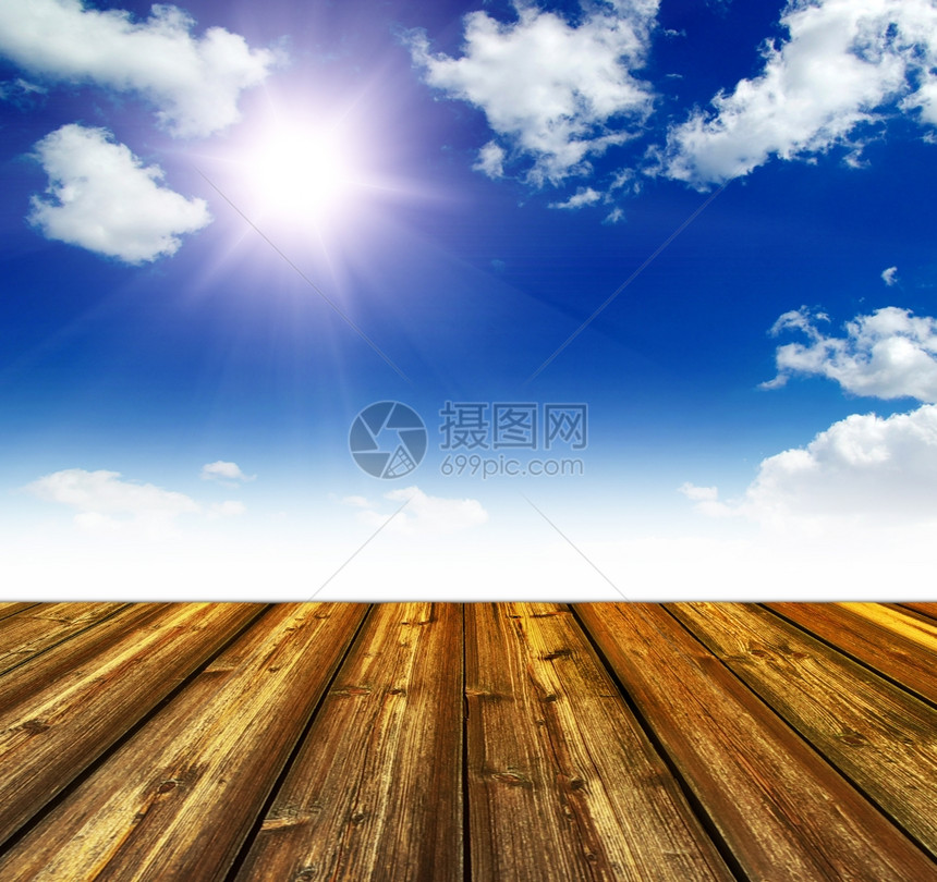蓝天空和木地板背景图片