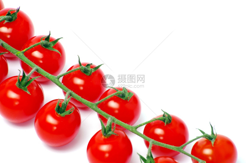 白孤立的樱桃西红柿图片