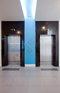 电梯前室在大厅闭门的现代电梯前视线背景