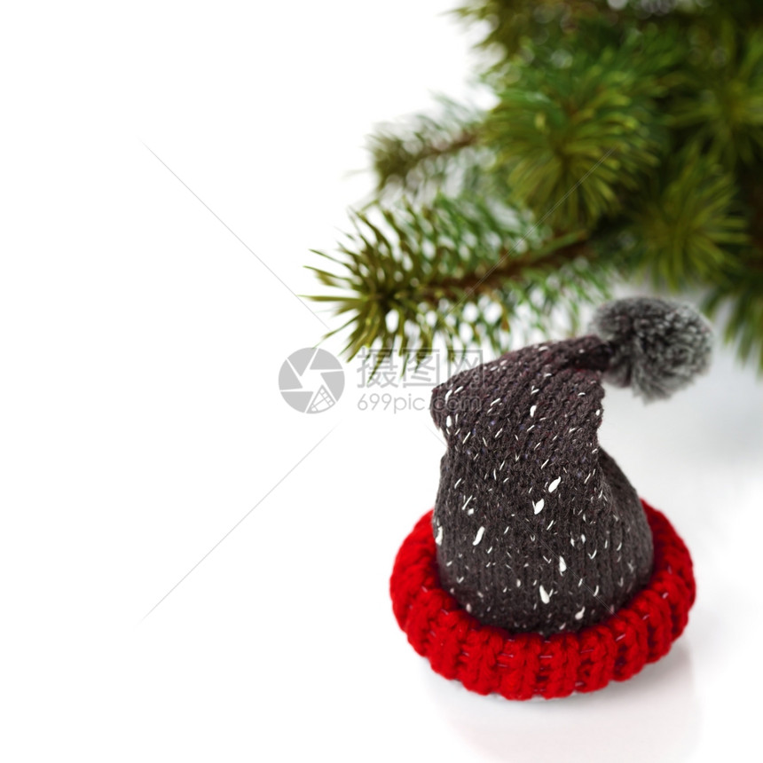 光亮的圣诞节组成带有小的Santa帽子图片