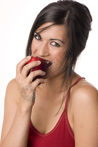 苹果一天女人咬红美食水果苹丽的红褐色和苹果图片