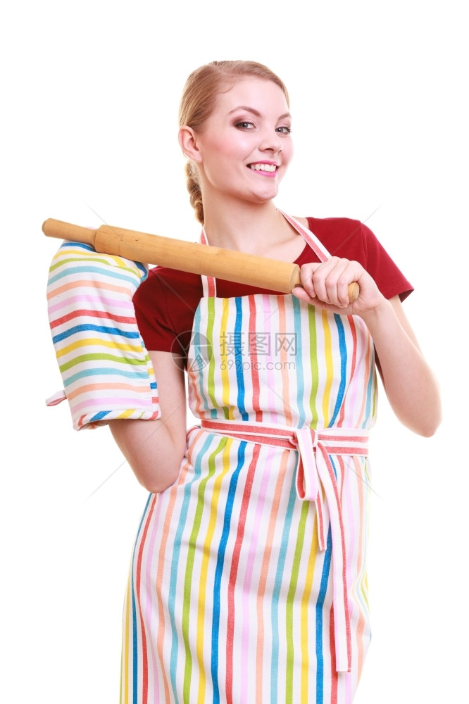快乐的家庭主妇或身着厨房围裙的面包师厨身着房的围裙烤炉手握着白色孤立的滚动针工作室照片图片