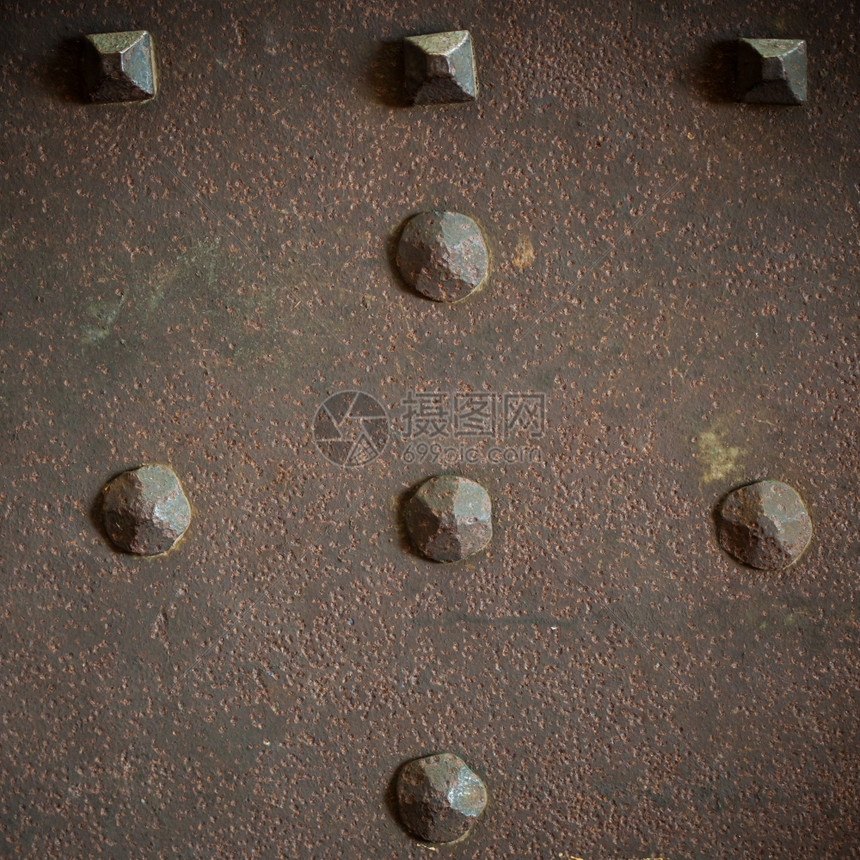 Browngrunge金属板或底有的装甲纹理方形图片