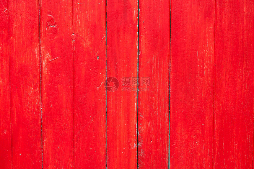 手工涂成红漆的旧木质纸背景图片