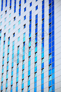 现代建筑未来商业企玻璃公司建筑城市背景图片