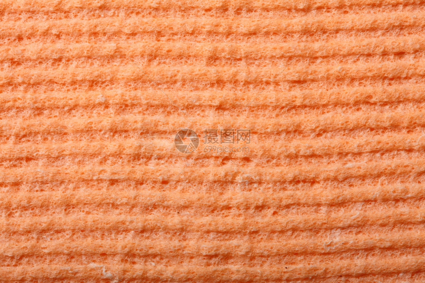橙色厨房海绵橡胶泡沫作为背景质料图片