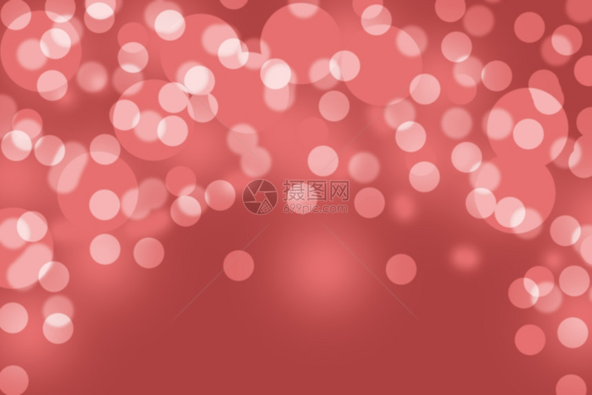 红色bokeh模糊的抽象光灯节日背景图片