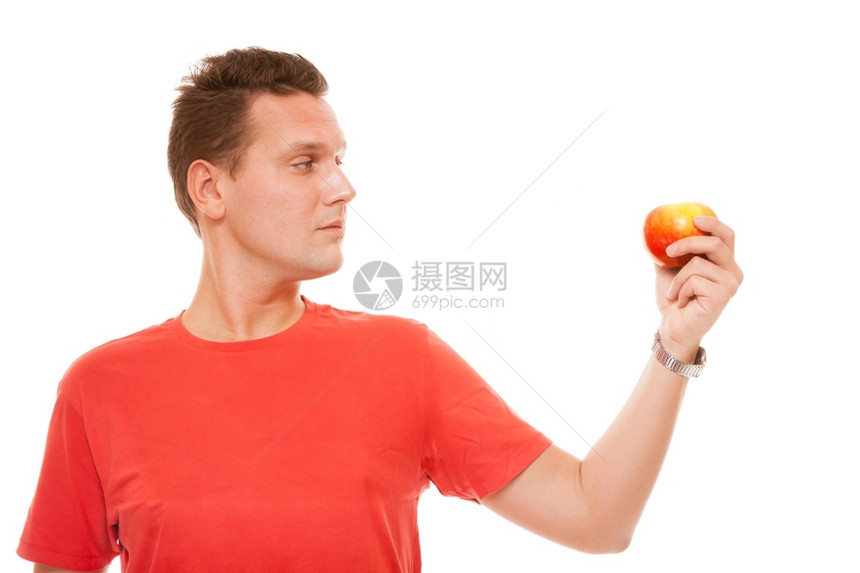 穿红衬衫的帅哥拿着苹果天然水维他命图片