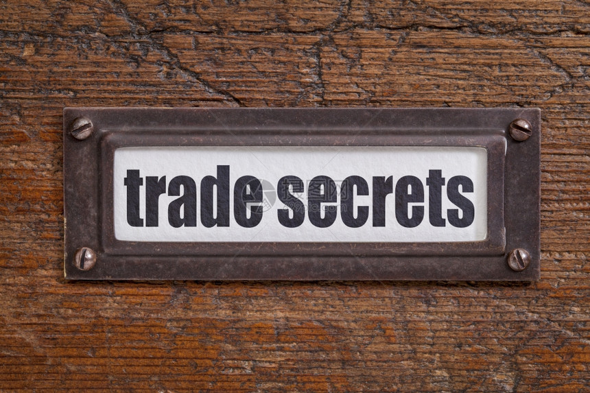 贸易秘密文本档案柜标签铜持有者反对冷冻和刮过的木材图片
