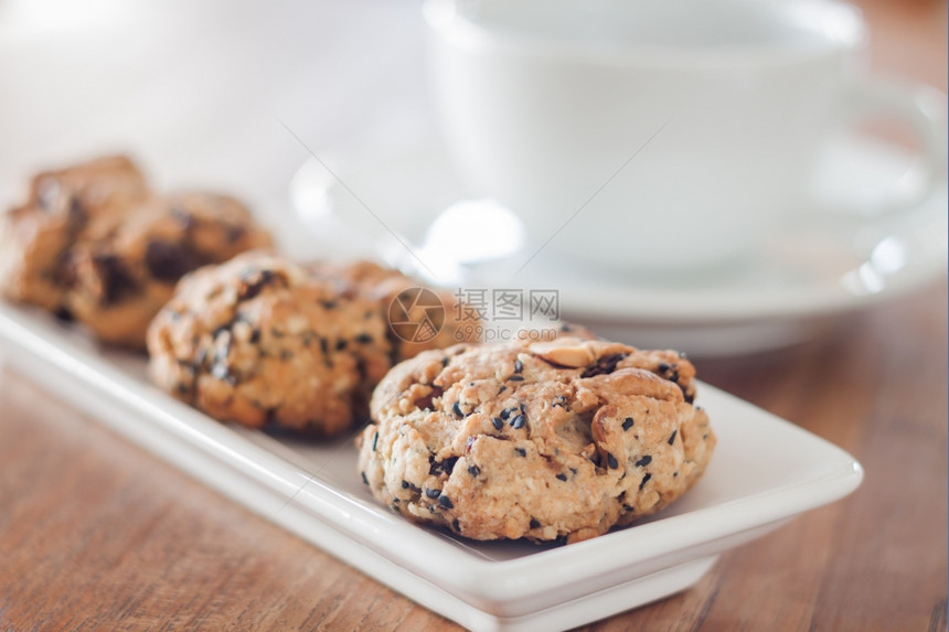 用咖啡杯股票照片来闭合健康饼干图片