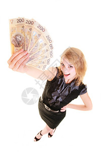 幸运的女商人持有抛光币钞票金融储蓄概念图片