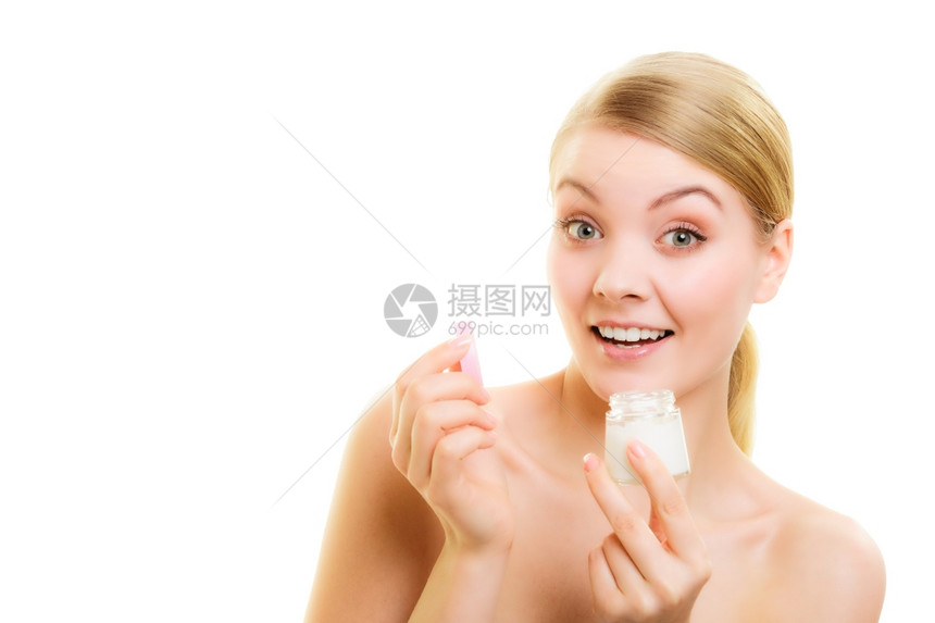 皮肤科年轻女孩照顾干燥的皮肤使用湿润的乳霜隔离美容治疗图片