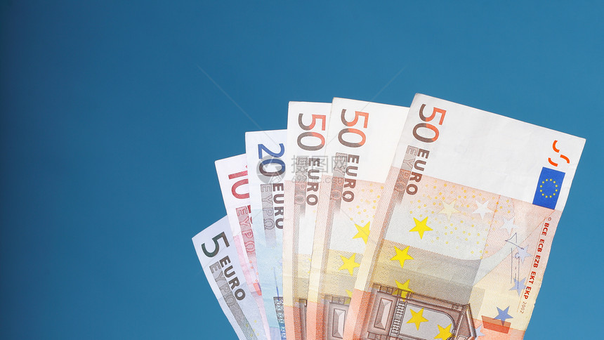 蓝背景欧元货币钞票图片