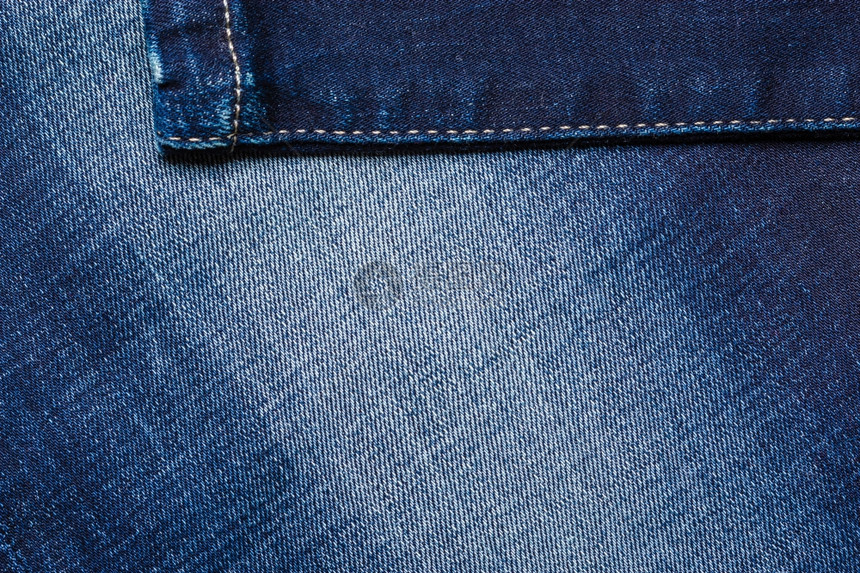 Bluedenim牛仔裤轮廓纹理背景的特写细节图片