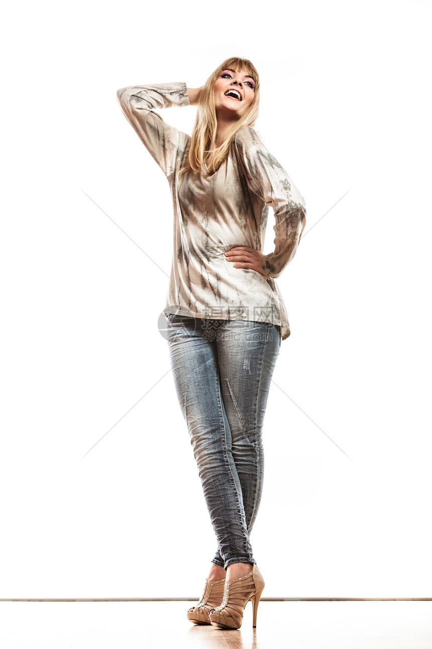 时装迷人的金发时尚女装牛仔裤短亮袖子衬衫图片