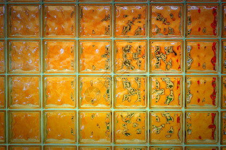 橙色玻璃墙壁纹理背景图片