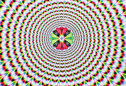 数字抽象图像蓝色红黄绿和紫爆炸产生一种运动的光学幻觉背景图片