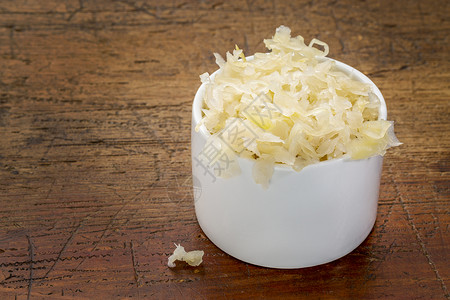 酸菜边盘子一种用生木制成的白墨水碗图片