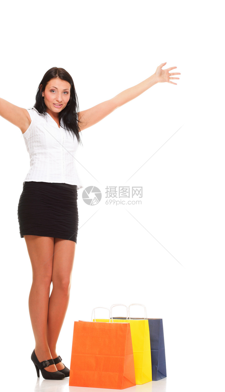 满身是快乐的年轻女士带着孤立的白种背景购物袋图片