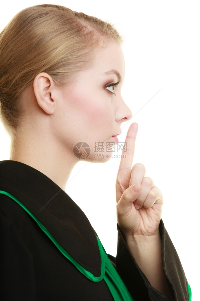 法院或司概念温律师典型的擦黑绿袍手指嘴唇机密信息图片