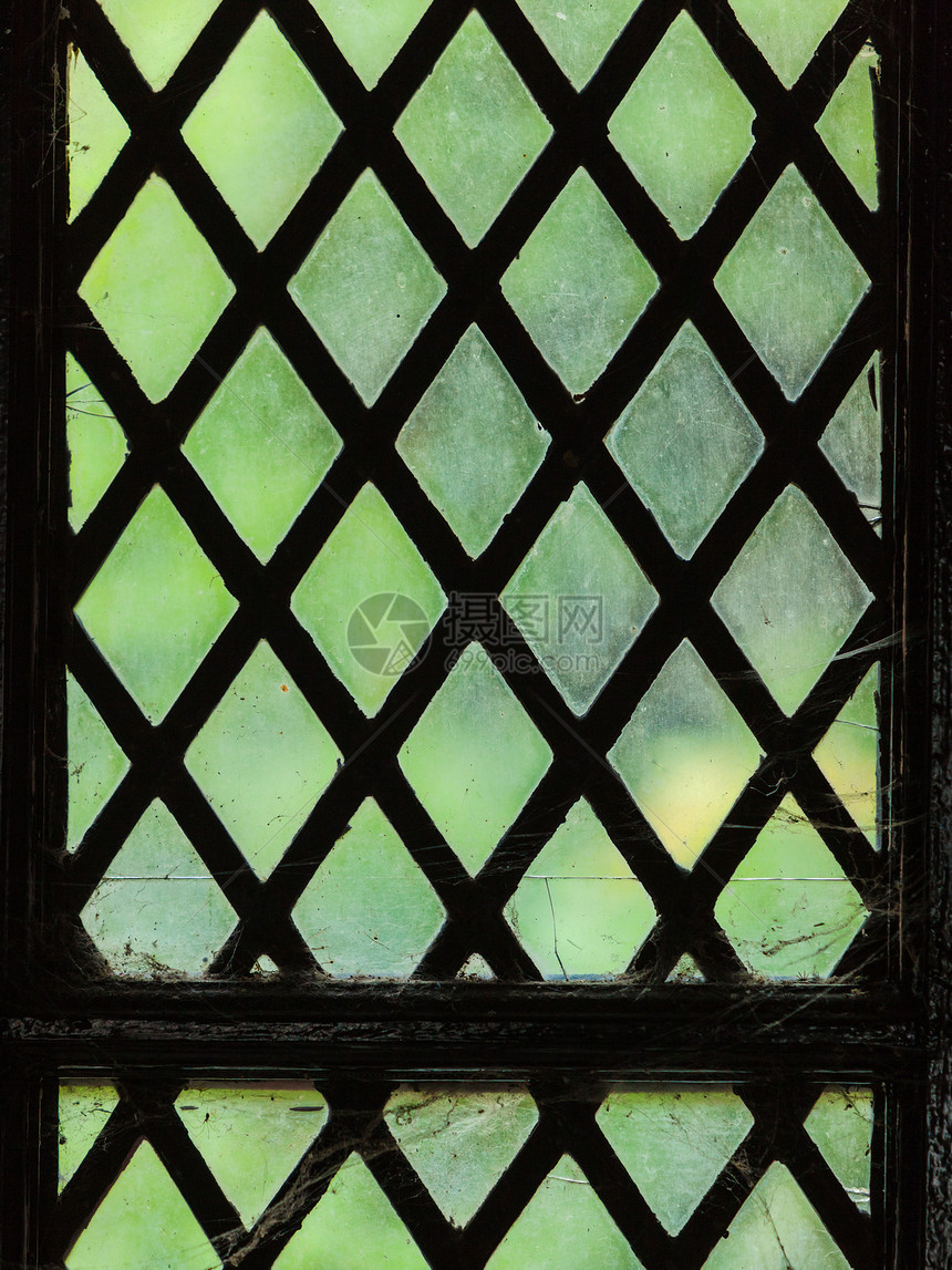 绿色彩玻璃窗背景为普通块图案图片
