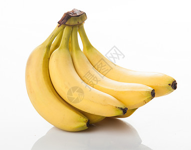 一群被白种背景孤立的香蕉高清图片