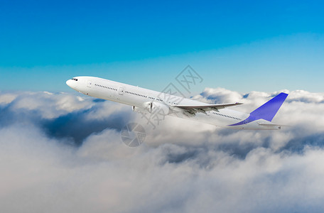 蓝色空中客机飞行蓝色的客机在云层中飞行图片
