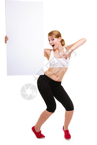 健身和康生活方式广告年轻女持有空白横幅的广告复制空间孤立在白色背景上图片