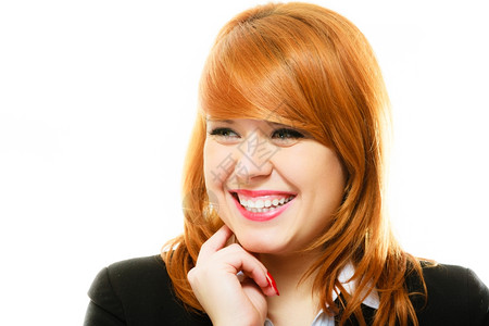 美丽红头发牙的肖像微笑着商业妇女或学生图片