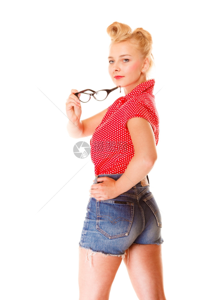 年轻金发美女旧型拿着眼镜摄影棚图片