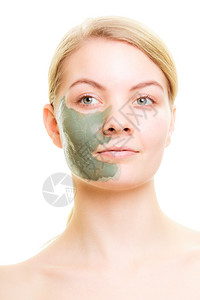 皮肤护理脸部被泥蒙着的女人孩照顾干皮肤美容治疗图片