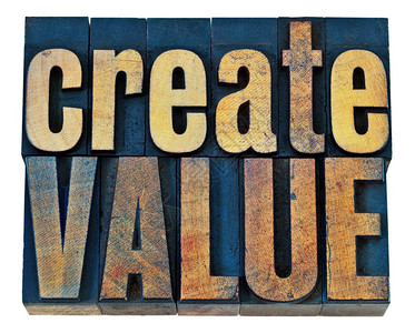 为用户创造价值创建值打字灵感概念古书印木制板块中的孤立单词背景