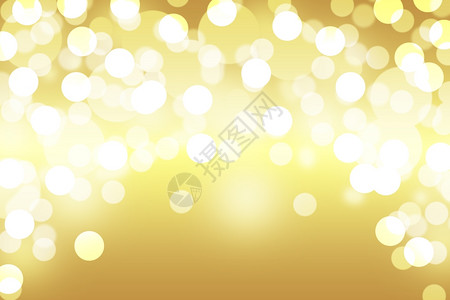 黄色bokeh模糊的抽象光灯节日背景图片