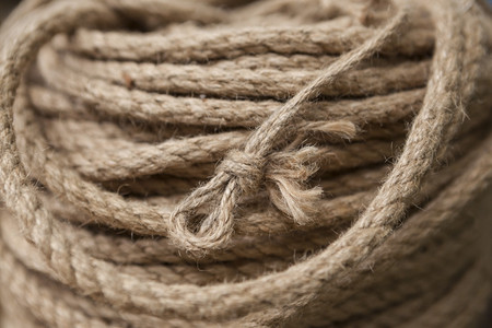 绳子与海洋结环绳子与海洋结环轮船绳作为背景纹理图片