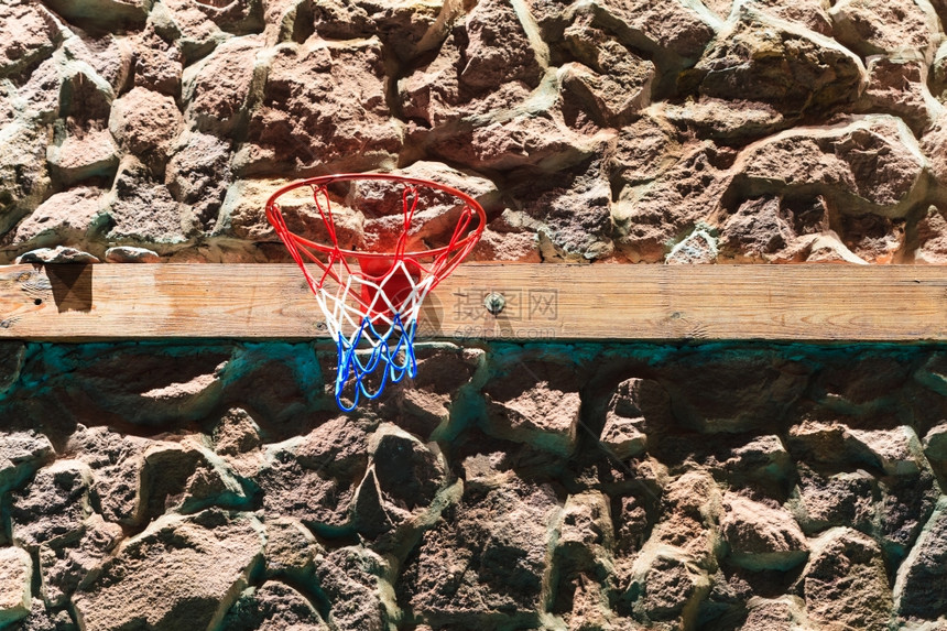 体育积极生活方式概念石墙背景篮子图片