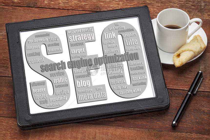SEO搜索引擎优化在数字平板电脑上有咖啡的文字云图片