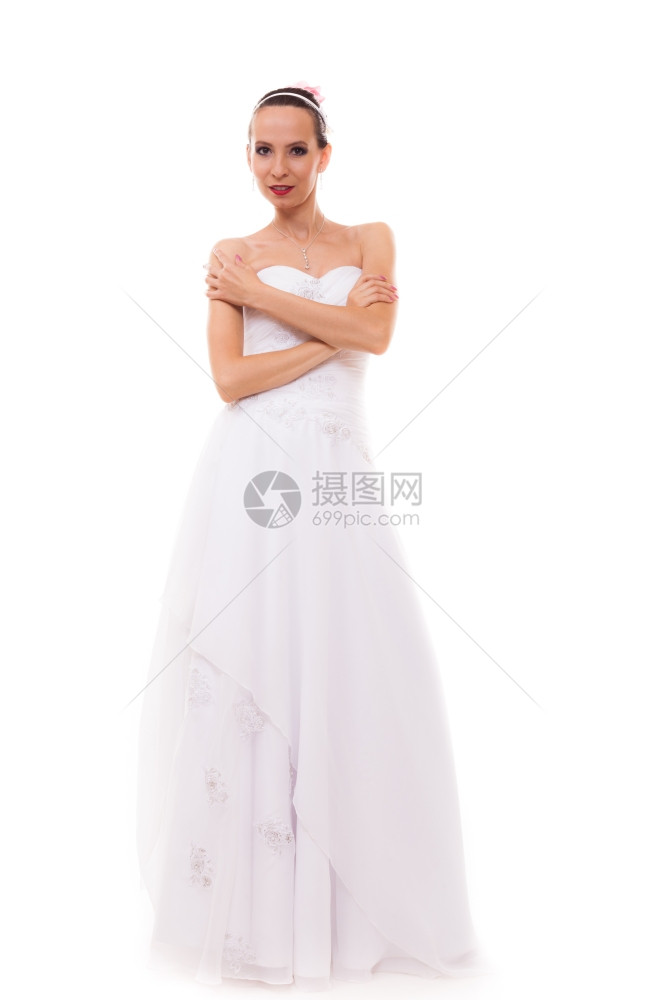 穿着白袍的全长年轻有魅力的浪漫新娘白衣与背景隔绝图片