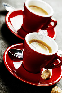 咖啡节深底的红咖啡杯背景