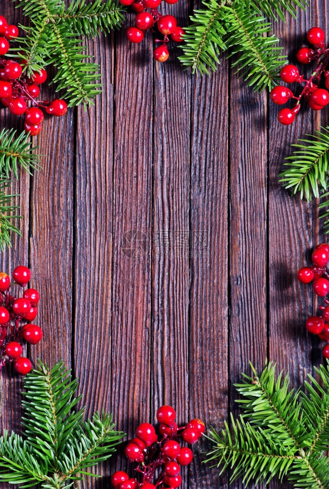 圣诞节背景装饰在木制桌子上图片
