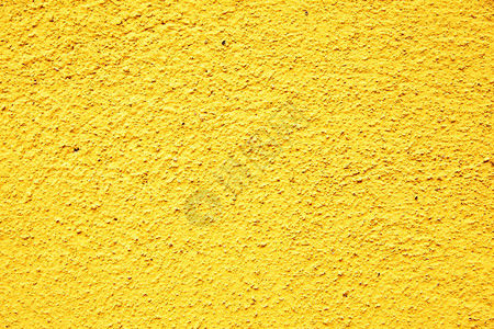 黄色stucco纹理可用作背景图片