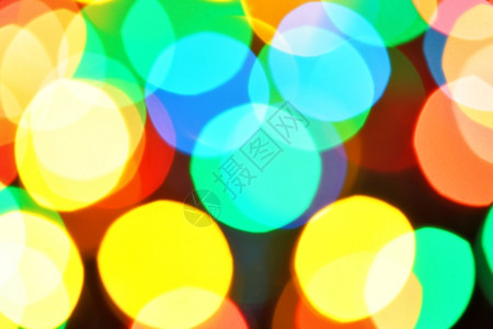 远离焦点和恒星的色彩多圣诞节灯可用作背景图片