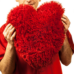 红色心脏被孤立的男子红色心爱的象征情人节快乐的概念图片